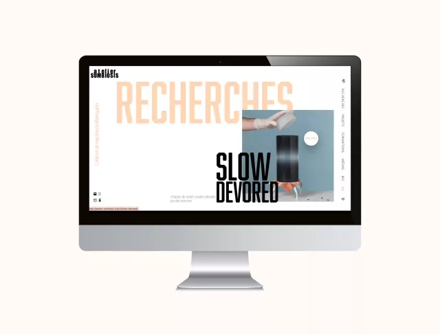 iMac showing the Atelier Sumbiosis website